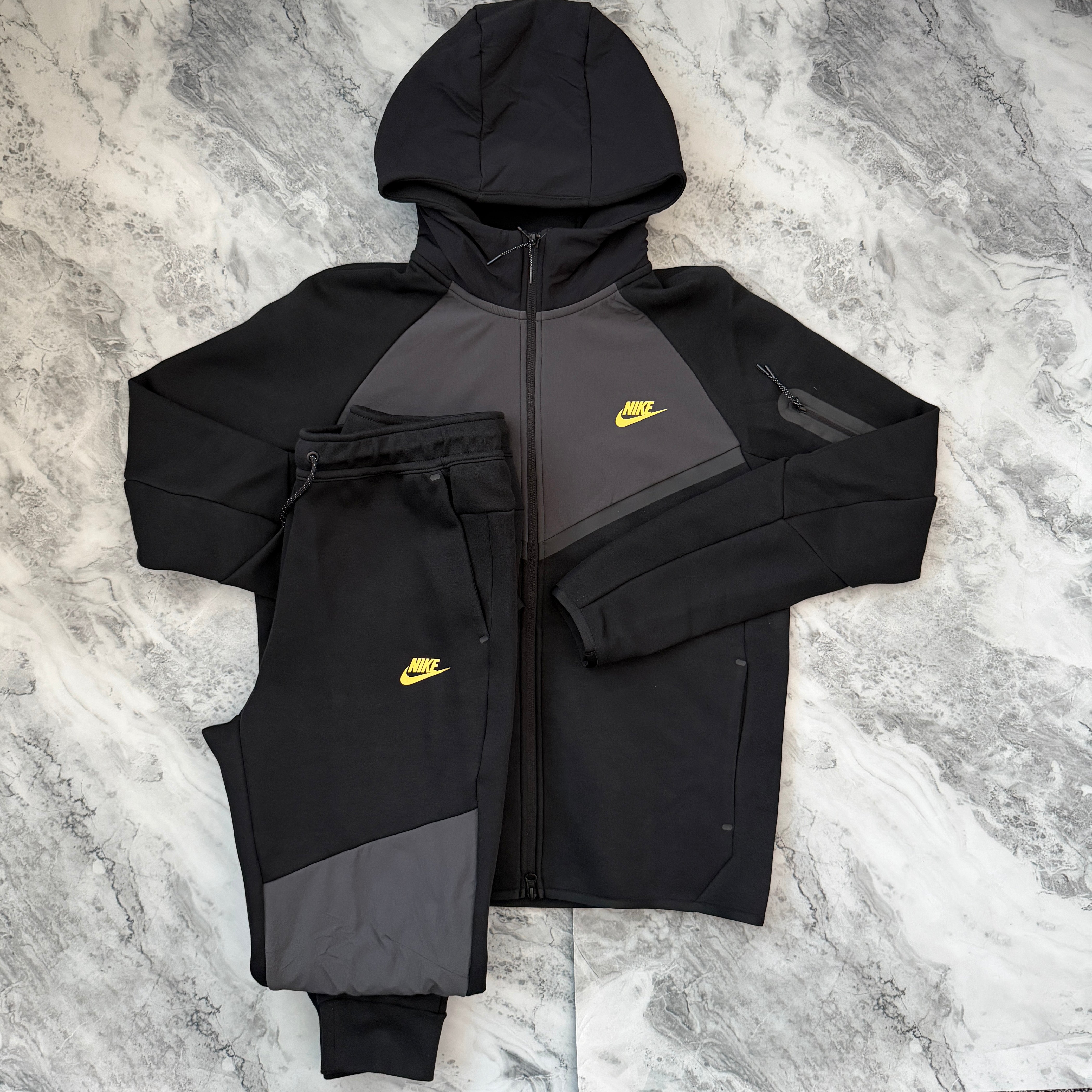 charcoal nike tech fleece